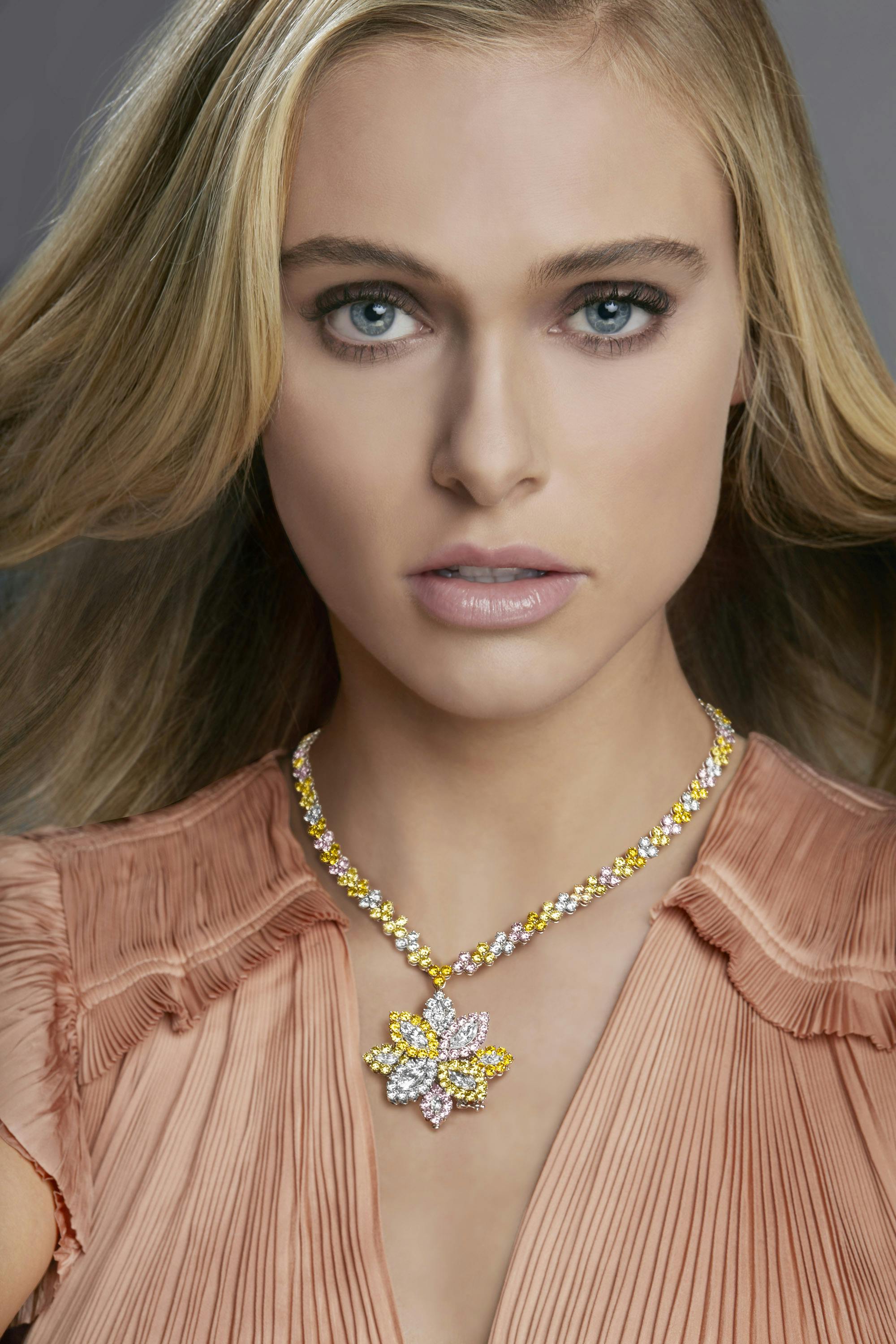 Model wearing diamond pendant