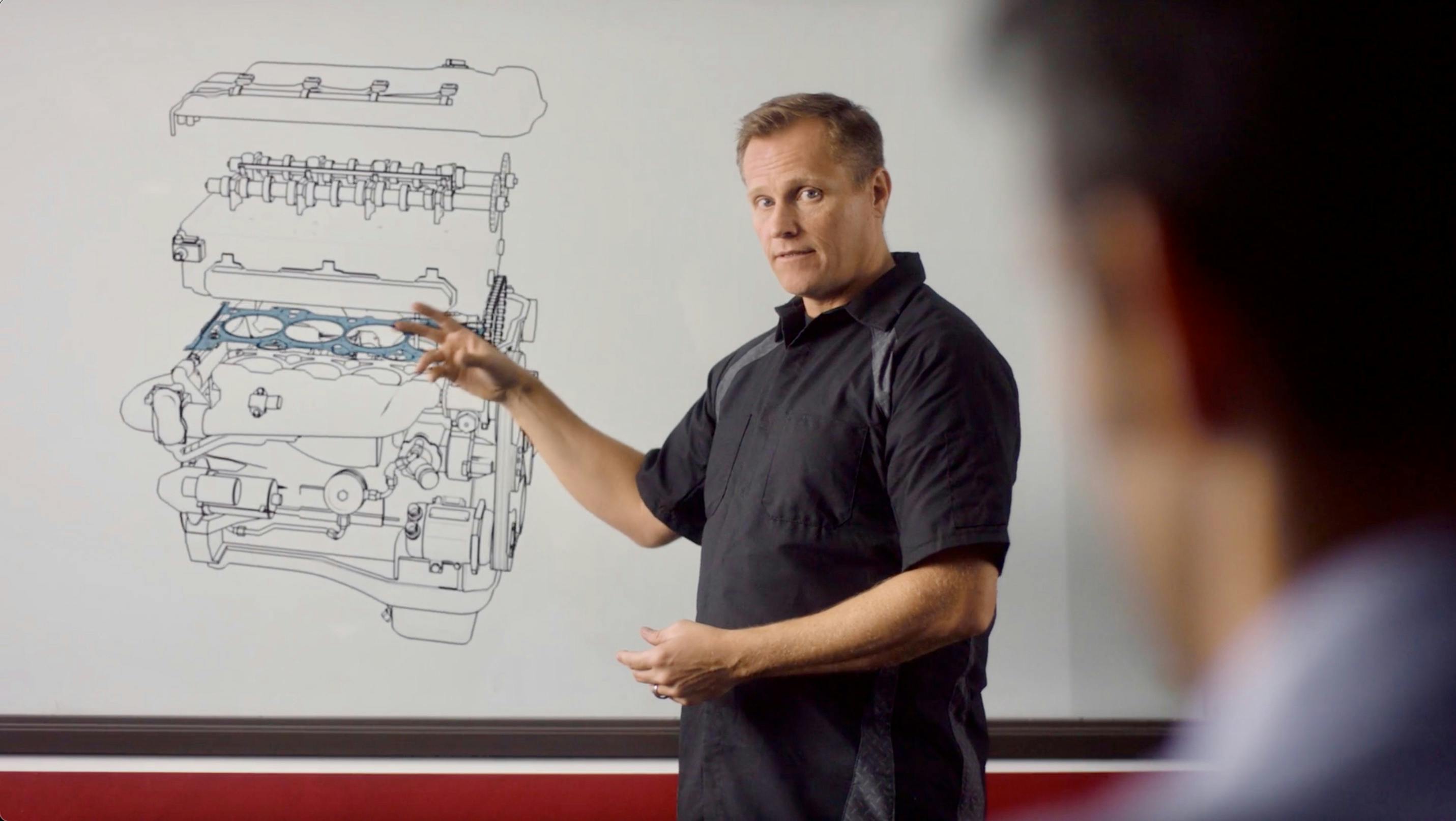 Screenshot of trainer explaining an engine to student